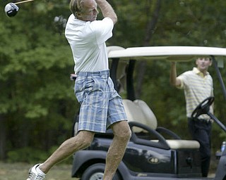 William D Lewis | The Vindicator Dick Marlowe drives at TCC Sunday.