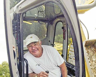 William D Lewis The Vindicator Work underway for replacement of Sommers Fountain in MCP. Buzz Gubany, owner of Mrphy contracting who is doing work on hte project is reflected in hte mirror of an excavator atthe site.