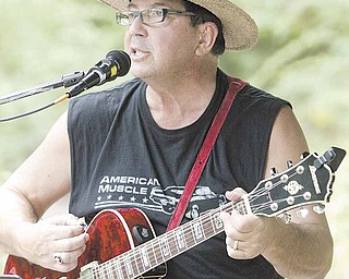 Joe Warino, guitarist with the Classic Cruisers, performs during the Celebration in the Park.