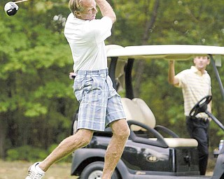 Dick Marlowe drives the ball during Round 2 of The Greatest Golfer of the Valley tournament Sunday at
Trumbull Country Club in Warren. Marlowe, out of Tippecanoe Country Club, shot a 1-over-par 71 Sunday at
Trumbull for a 144 total and a four-shot lead in the Open Division over fi rst-round leader Mike Porter going
into this weekend’s championship at The Lake Club in Poland.