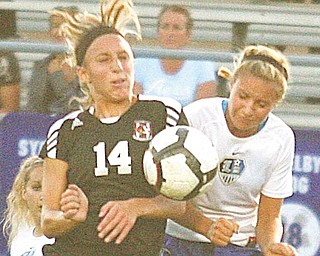 (14) Meredith Gleichert of Canfield and Lindsey Clark of Lakeview fight for the ball Monday night in Lakeview.