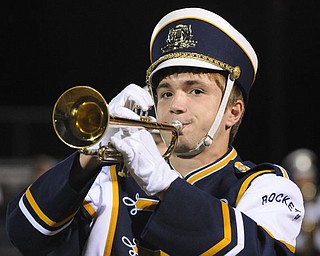 Michael Mangine entertains the crowd with a trumpet solo during the Lowellville / Springfield game on Friday