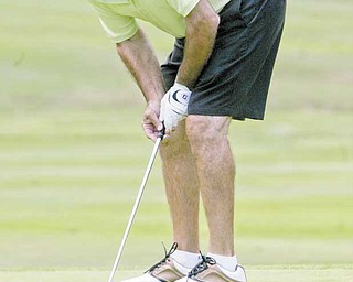 Tom Onesti watches a putt lip the cup on No. 18 at Greatest Golfer of the Valley Tourney last Saturday at Mill Creek. Onesti leads the 13-over Handicap Division heading into this weekend’s finals.