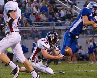 Geoffrey Hauschild|The VIndicator.Salem's Charles Shrontz (32) is unable to get his hands on the ball after Hubbard's Michael Lupuchovsky (6) broke up the pass during the second quarter of a match up between Salem and Hubbard at Hubbard Stadium on Friday evening.
