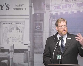 H. William Lawson, executive director of the Mahoning Valley Historical Society, discusses the progress of a fund-raising campaign to restore the three-story Harry Burt/Ross Radio building on West Federal Street, downtown Youngstown, to serve as the society’s new headquarters.