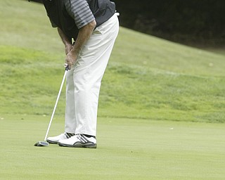William d LEwis The Vindicator Ed Antonelli winner of super senior golf tourney comes up short on a putt..