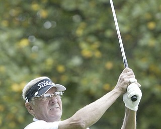 William d LEwis The Vindicator Bob Leonard winner of senior golf tourney tees off.