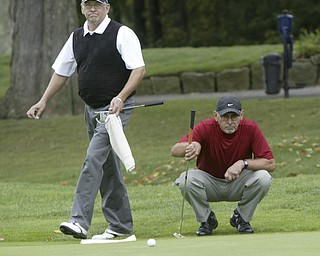 William d LEwis The Vindicator Bob Leonard winner of senior golf tourney , left, and runner up Kurt Beler during sudden death playoff..