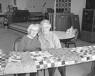 Craft show in Niles: The Niles S.C.O.P.E. Senior Center will sponsor a craft show from noon to 6 p.m. Sept. 28 at the center, 14 E. State Street. Tables are available for $10, and local crafters are welcome to participate. The show also will feature the Niles Art Class as well as the Monday Quilters Group. Above, Shirley Dull, left, and Evelyn Stillwagon work on a new quilt in preparation for the show. Proceeds from the event will go toward a new quilting frame for the group. For table reservations call 330-544-3676.