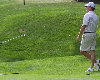Geoffrey Hauschild|The Vindicator
Bryan Horne, of Youngstown Country Club tosses a club after a botched stroke on hole 16 at The Lake Club during the open division of the Greatest Golfer in the Valley tourney.