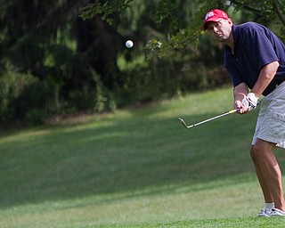 Geoffrey Hauschild|The Vindicator
Tom Kellogg takes a shot on hole 16 at The Lake Club during the open division of the Greatest Golfer in the Valley tourney.