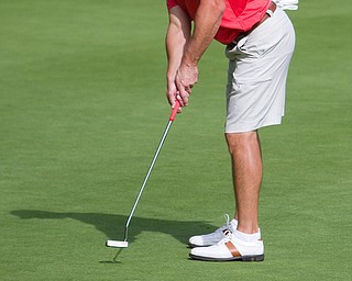 Mike Porter of Canfield, putts on the 17th hole at The Lake Club during the open division of the Greatest Golfer in the Valley tourney. Mike Porter shot a 3-over-par 73 in the final round and emerged as the champion.
