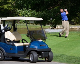 Geoffrey Hauschild|The Vindicator
Joshua Zarlenga, of Youngstown CC, tees off on the 18th hole at The Lake Club during the open division of the Greatest Golfer in the Valley tourney.