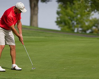 Geoffrey Hauschild|The Vindicator
Mike Porter of Tippecanoe, sinks his final put on the 18th hole at The Lake Club during the open division of the Greatest Golfer in the Valley tourney, which he won by one stroke.