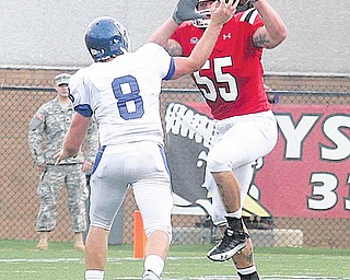 Gunnar Jespersen tries to avoid (55) Stephen Meadows Saturday evening.
