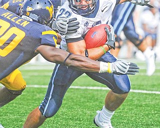 Villanova's Angelo Babbaro (22) looks to run by West Virginia's Franchot Allen (20) during the second quarter of a football game Saturday, Aug. 30, 2008 in Morgantown, W.Va.