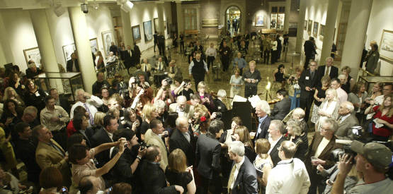 William D. Lewis The Vindicator Ronnie Wood shakes hands with visitors  at the Butler Museum of American Art Sept. 21, 2010.