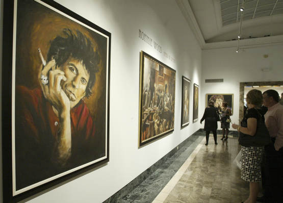 William D. Lewis The Vindicator Spectators look at Ronnie Wood  art at the Butler Museum of American Art Sept. 21, 2010.