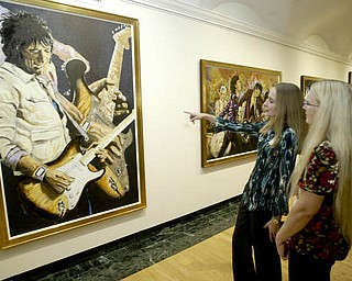 William D. Lewis The Vindicator Sarah Hoefert, left, and her mother Laurie Hoefert of North Lima look at Ronnie Wood art at the Butler Museum of American Art Sept. 21, 2010.