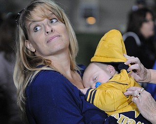 Never too young.....Carter Hvisdak (with Aunt Tonya Boggia) never misses a Lowellville Rocket game!