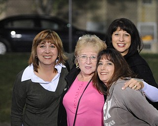 Faithful fans and alumni..former Lowellville school secretary and treasurer Sandy Lellio is surrounded by former LHS students Lisa (Boggia) Perry, Nancy (Perry) Grapevine and Tricia (Melillo) Notareschi at the Lowellville/western Reserve game.
