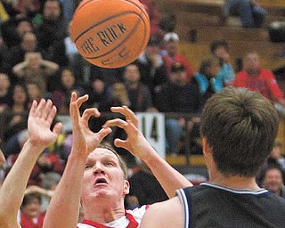 Youngstown State senior basketball player Vytas Sulsksi goes for a rebound in the fi rst half of a basketball
game at the Beeghly Center last season. Head coach Jerry Slocum said Sulskis and junior teammate Ashen Ward have shown increased leadership during the team’s off season workouts.