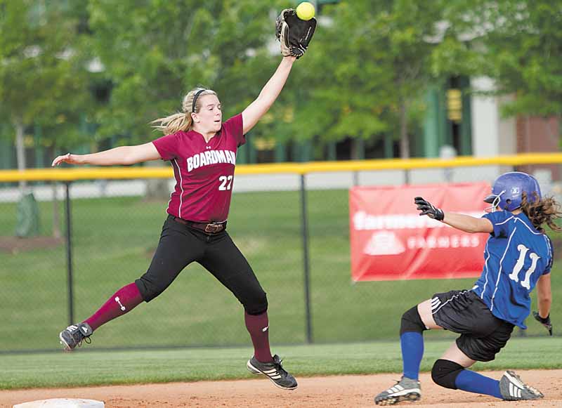 Boardman's Brooke Meenachan, reaches up and successfully makes the catch but not in time to keep Madison's Ashley Palmer from safely arriving at second base during the first inning of the 2010 Div. 1 Regional Semifinal game at the University of Akron's Lee R. Jackson Softball field.