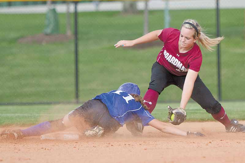 Boardman's Brooke Meenachan, successfully makes the catch but not in time to keep Madison's Ashley Palmer from safely arriving at second base during the first inning of the 2010 Div. 1 Regional Semifinal game at the University of Akron's Lee R. Jackson Softball field.