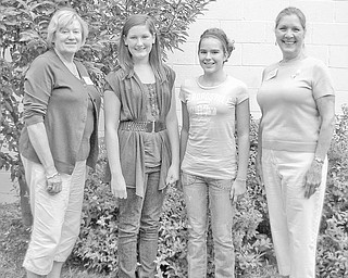 AAUW college program: The American Association of University Women, Warren-Trumbull County Branch, met recently at the Cortland Conservation Club and welcomed two guests. The AAUW sponsored two students to attend Be WISE camp, a mathematics, science and technology camp in June at Dennison University. From left are Martha Flint, Be WISE chairwoman; Briana Marin, student at Neal Middle School, Fowler; Dominic Williams, student at Lincoln School, Warren; and Isabel Seavey, AAUW president. For more information contact Flint at flintfarm@aol.com or visit the Be WISE website, bewisecamp.org. The October meeting of AAUW Warren-Trumbull County Branch will be Oct. 4 at Leo’s Ristorante.