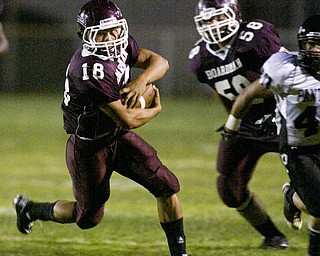 William D. Lewis The Vindicator Nick Bounavolonta of Boardman carries the ball during 1 rst qtr action Friday.