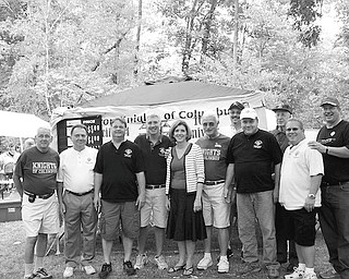 Buhl Day celebration: Pictured with U.S. Rep. Kathy Dahlkemper, D-3rd, of Pennsylvania, are members of the Knights of Columbus Sharon Council 684 and Our Lady of the Valley Council 4003. The Knights of Columbus are known for their charity work. Representatives of the two councils stood in front of their food booth at the annual Buhl Day celebration, which took place Labor Day in Buhl Park, Hermitage.