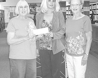 We Love Libraries! From January through December monthly grants of $1,000 are being awarded by Sisters in Crime in conjunction with its “We Love Libraries” lottery. In July, Newton Falls Public Library, 204 S. Canal St., Newton Falls, was the winner of the lottery. Taking part in the check presentation ceremony were, from left, Gloria Alden, a member of Sisters in Crime; Kerry Reed, library director; and Phyllis Mackey, mystery reader. The funds will be used to purchase books.