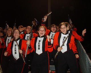 Members of the Springfield Local marching band have a blast as they dance at the Spingfield-Lisbon game.