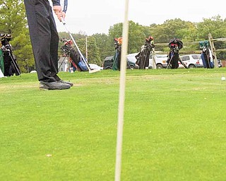 Troy Dombroski practices his put with the rest of the McDonald golf team at Mahoning Country Club on Tuesday. Dombrowski leads the team with a scoring average between 35 and 36.
