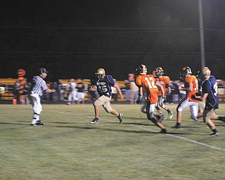 Lowellville Rocket No. 45 Geno Tkach makes a touchdown during the Springfield game.