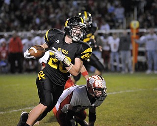 Crerstview's Andrew Mayer runs against the Columbiana defence during their game at Crestview on Friday night. Photo/Mark Stahl