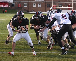 FOOTBALL - Trent Toothman follows the block of (20) Eric Bailey into the end zone Friday night in Salem. - Special to The Vindicator/Nick Mays