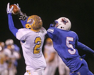 ROBERT K. YOSAY | THE VINDICATOR..Easy catch as Indians Trey Griffith hauls in a pass defending is Blu Devils # John Rosati - Western Reserve Blue Devils vs Southern Local Indians at Western Reserve Stadium ..-30-..