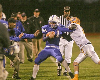 ROBERT K. YOSAY | THE VINDICATOR..Blue Devils #21 Ed Newhouse stops the clock as he is pushed out of bounds by Trey Griffith#2 of Southern Local during second Quarter action - Western Reserve Blue Devils vs Southern Local Indians at Western Reserve Stadium ..-30-..