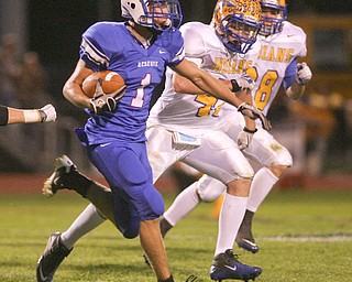 ROBERT K. YOSAY | THE VINDICATOR..Devils #1 Rylely Sheptock goes for a first down with #47 NO NAME ON ROSTER and #27 Indians Seth Utt as Western Reserve Blue Devils vs Southern Local Indians at Western Reserve Stadium ..-30-..