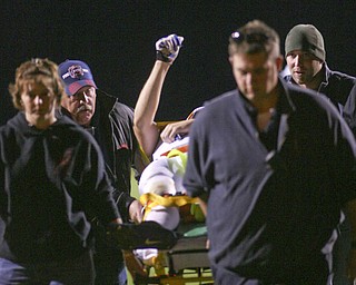 ROBERT K. YOSAY | THE VINDICATOR..an unidentified southern local player gives the thumbs up after being hurt in first quarter action - Western Reserve Blue Devils vs Southern Local Indians at Western Reserve Stadium ..-30-..