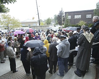 William d Lewis The Vindicator rally Saturday outside St Dom's church.