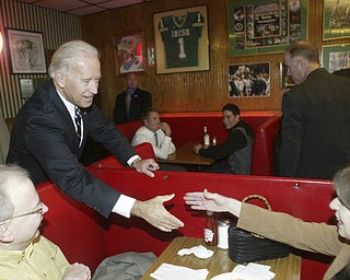 William d Lewis The Vindicator VP Joe Biden shakes hands with Mary Carmen Kelley and her brother Tim Curtin of Liberty during a Monday visit to Youngstown.