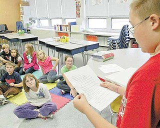 Evan Shobel, a fifth-grader and member of the Frank Ohl Intermediate School Drama Club, reads a part during auditions for “A Christmas Carol,” the school’s first play, based on Charles Dickens’ famous story.
