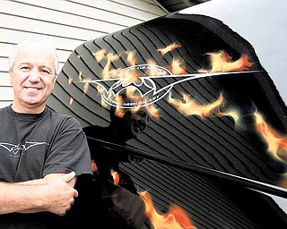 Steve Chaszeyka is the wizard behind Wizard Graphics, a custom pinstriping and airbrush business located in New Middletown. Steve and his wife, Carol, have owned and operated the shop for about 45 years..