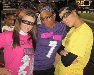 Ursuline irish fans dressed as superheroes for the game
