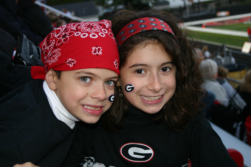 Young Girard fans, Francesca and Dante Byrne show their Indian spirit at the game against Hubbard.