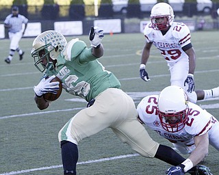 William D Lewis The Vindicator Usulines Akise Teague eludes St Charles #25 during first qtr action Friday.