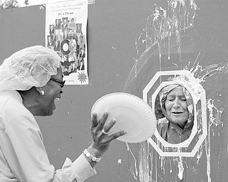 More than $1,500 was raised for the Community Food Warehouse during a recent “Day of Caring” sponsored by Sharon Regional Health System at the Sharon and Hermitage campuses. The fun-filled day included a popular pie-throwing event, during which a gleeful Patricia Sharper-Moore, registered surgical nurse, made a donation for the privilege of tossing a whipped cream pie into the face of Michelle Aurin, SRHS director of surgical services. Organized by Mickey Gula, director of Sharon Regional Community Outreach, and a committee of employees, the fundraiser featured a cookout at both campuses, games, raffles and other activities.