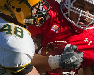 Geoffrey hauschild|The Vindicator.during the first quarter of a game at Youngstown State University's Stambaugh Stadium on Saturday evening.